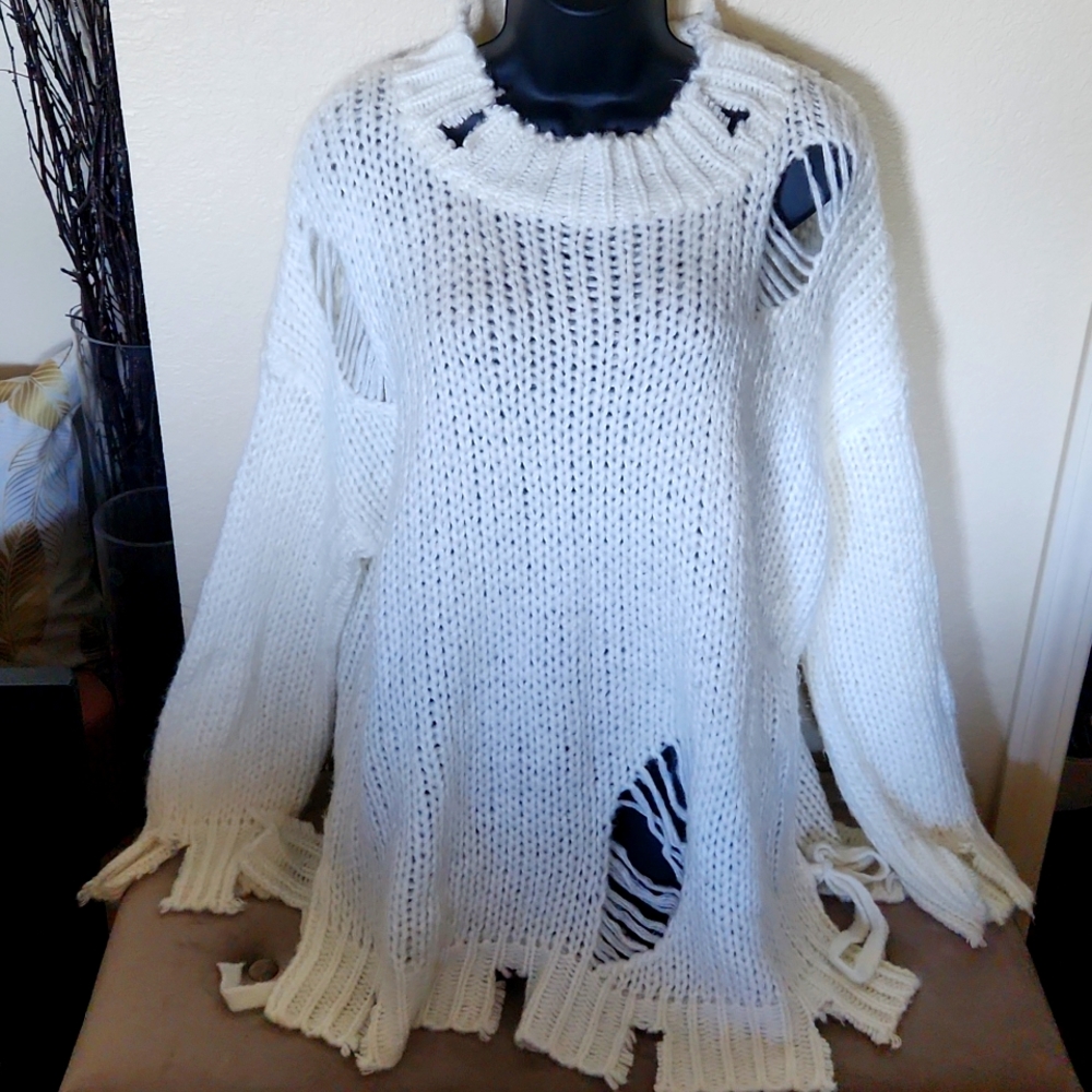 EUC distressed sweater.